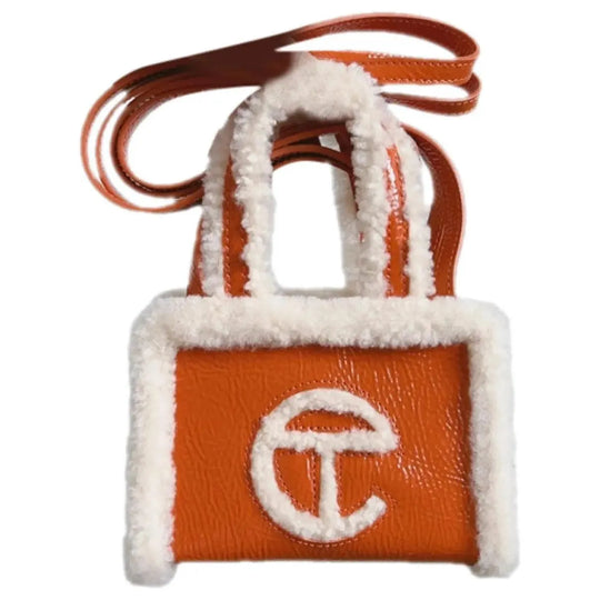 UGG x Telfar Patent Orange